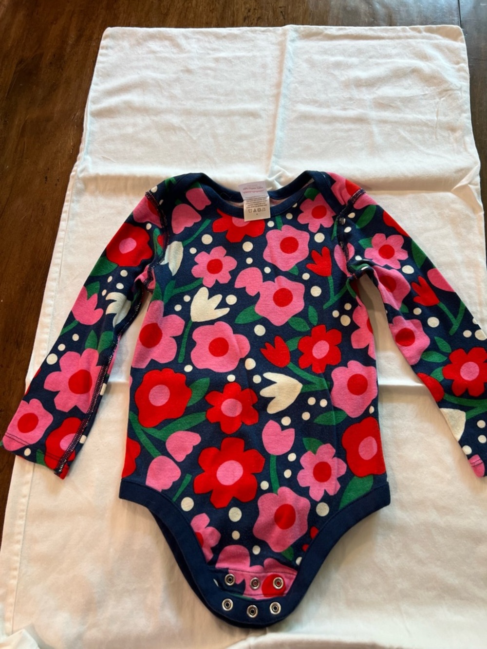 Hanna Andersson Navy Floral Long-Cotton Sleeve One-Piece Bodysuit. 3T